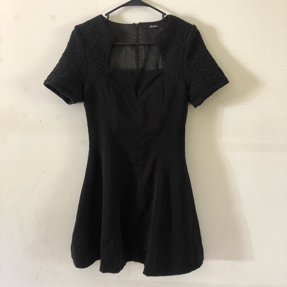 Lulu’s black quilted jagged neckline skater dress